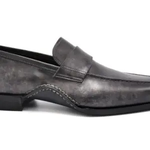 A sleek black leather men's loafer with a pointed toe.