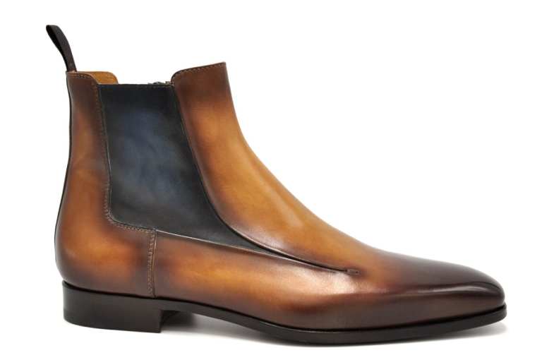 Elegant brown leather Chelsea boots with black elastic sides.